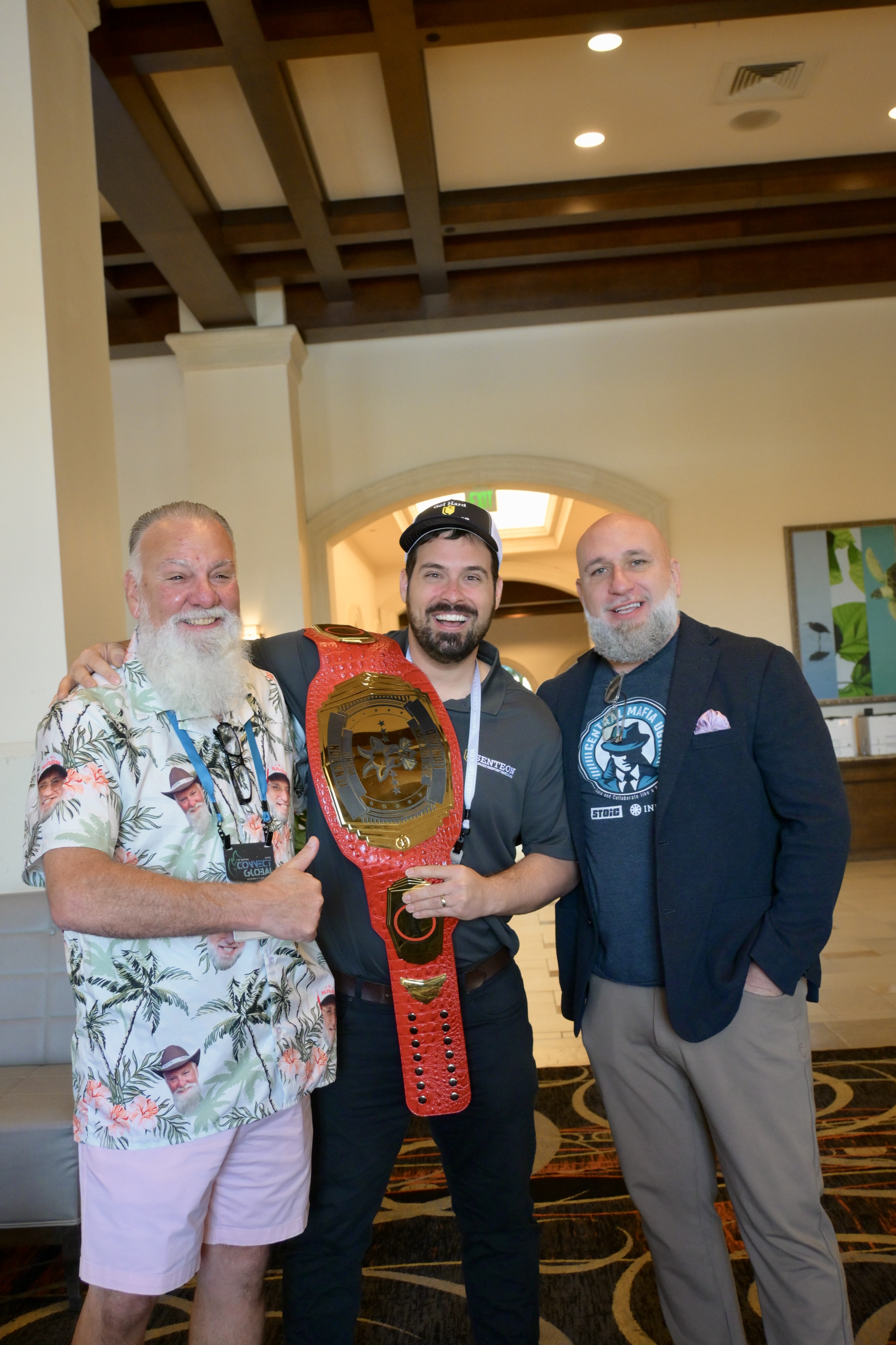 PitchIT event photo with attendees and championship belt